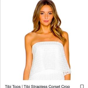 Strapless. Corseted.  Zipper back. Never worn.